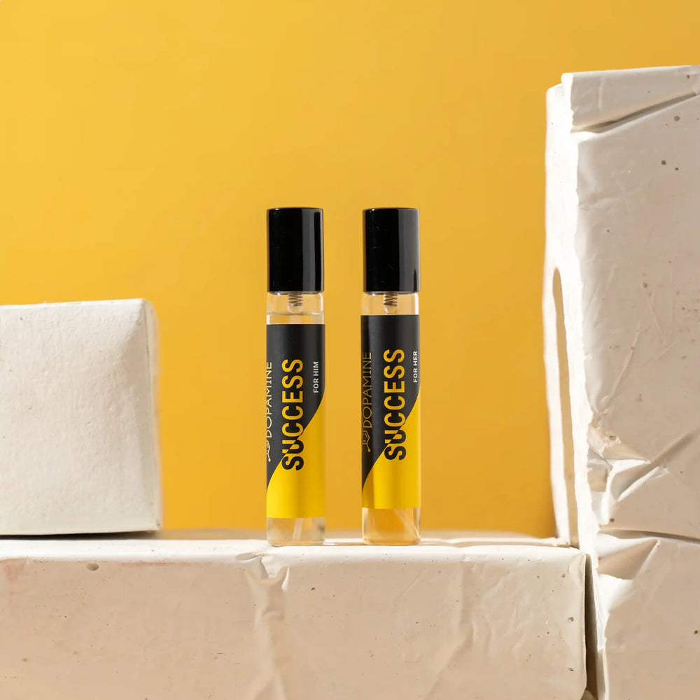 Success perfume set on white blocks