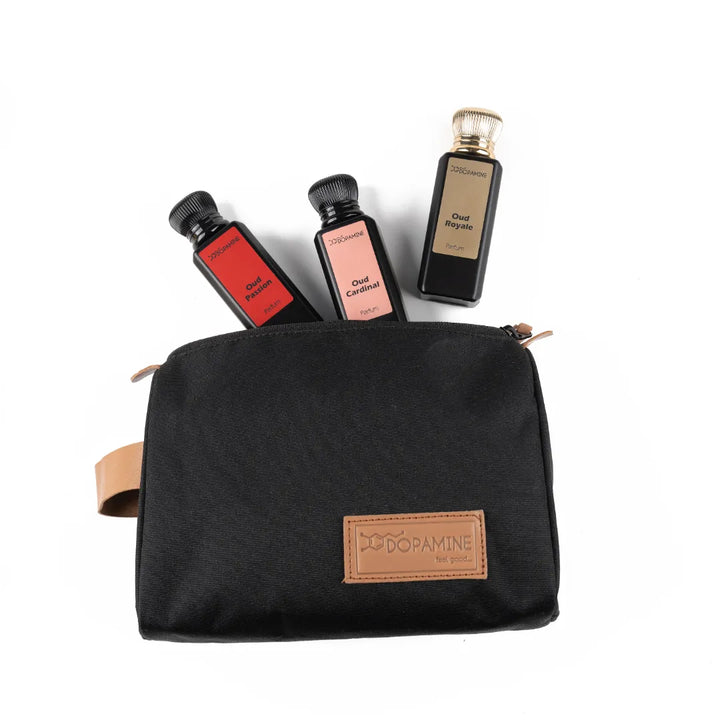 Dopamine Oud perfumes with black travel pouch